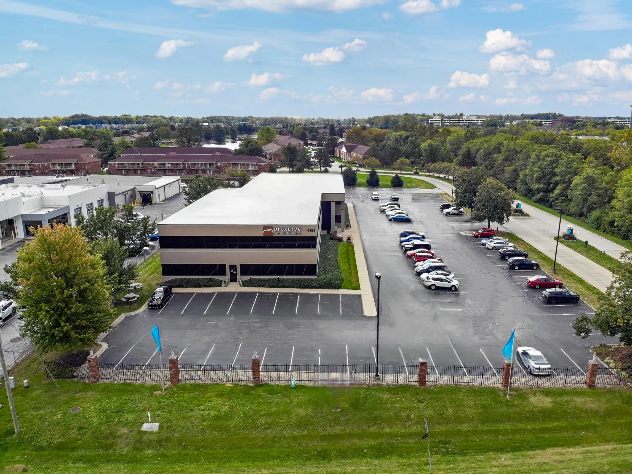 Aerial view of the Proxurve Solutions building and grounds on East 96th Street, Indianapolis